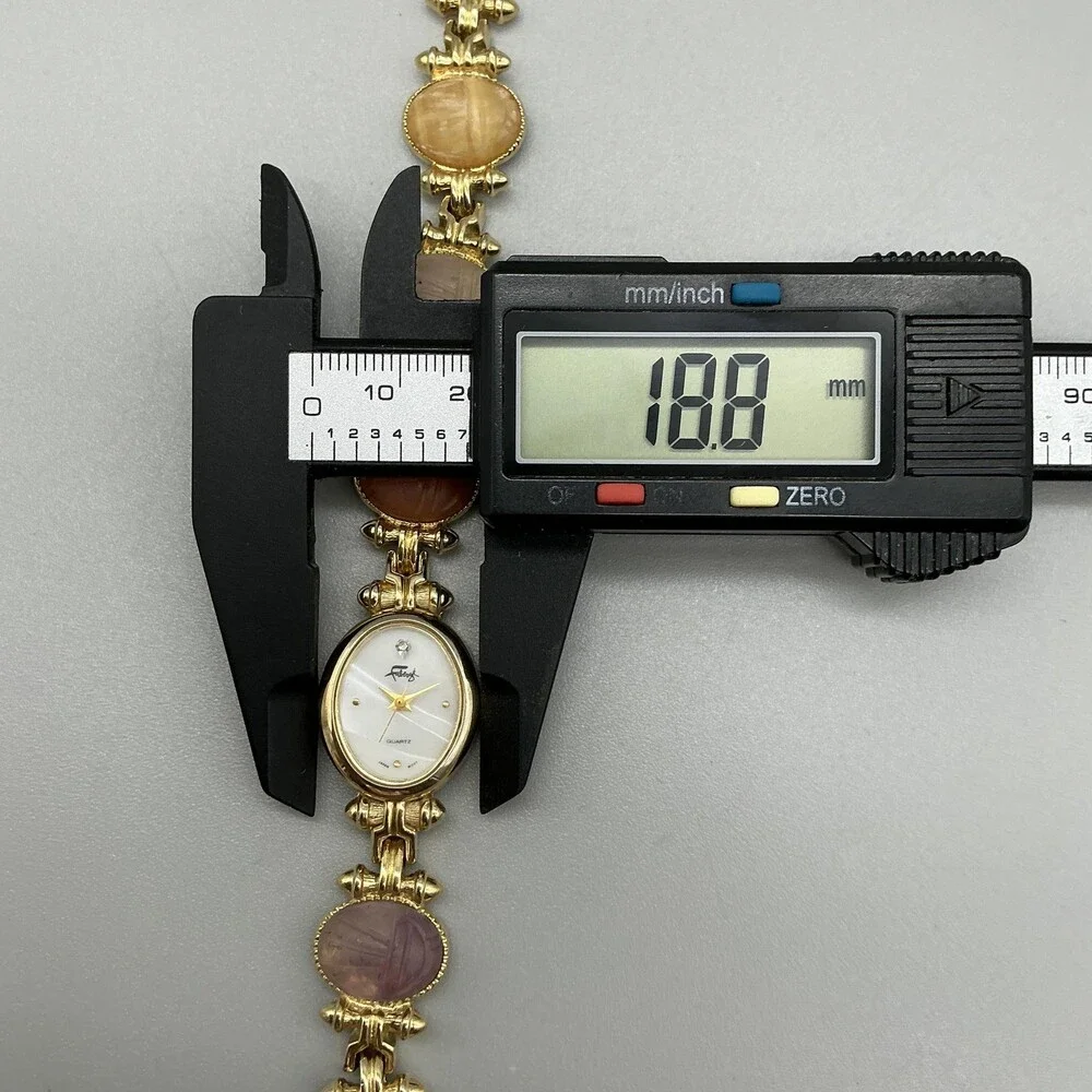 Faberge Scarab Womens Watch 19mm MOP Dial Gold Tone Multicolor New Battery 7.75